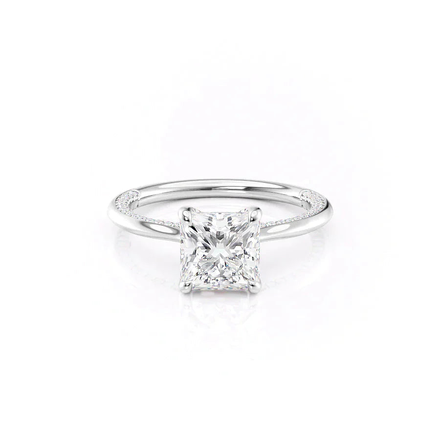 The Claire. A White Gold Solitaire, Pave Engagement Ring Set With A 2ct Princess Lab Grown Diamond. White Background.