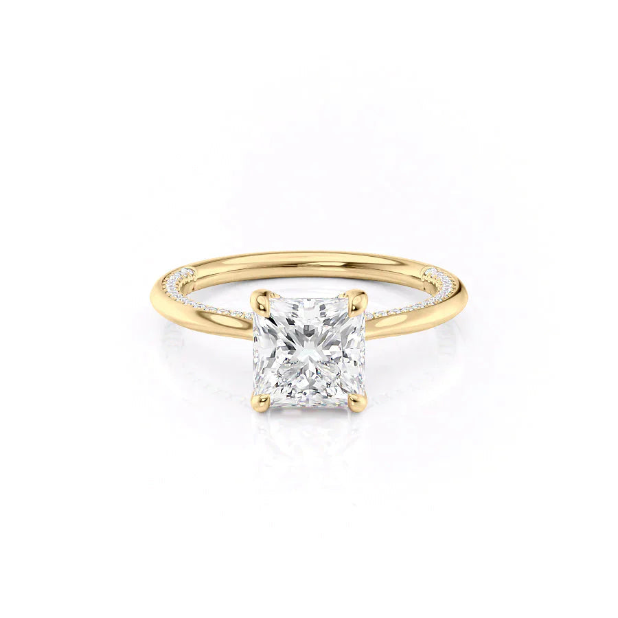 The Claire. A Yellow Gold Solitaire, Pave Engagement Ring Set With A 2ct Princess Lab Grown Diamond. White Background.