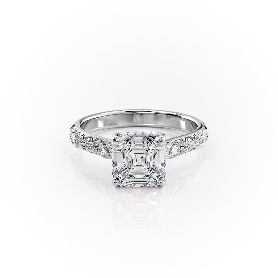 The Claudia. A White Gold Vintage, Hidden Halo, Side Stones Engagement Ring Set With A 2ct Asscher Lab Grown Diamond. White Background.