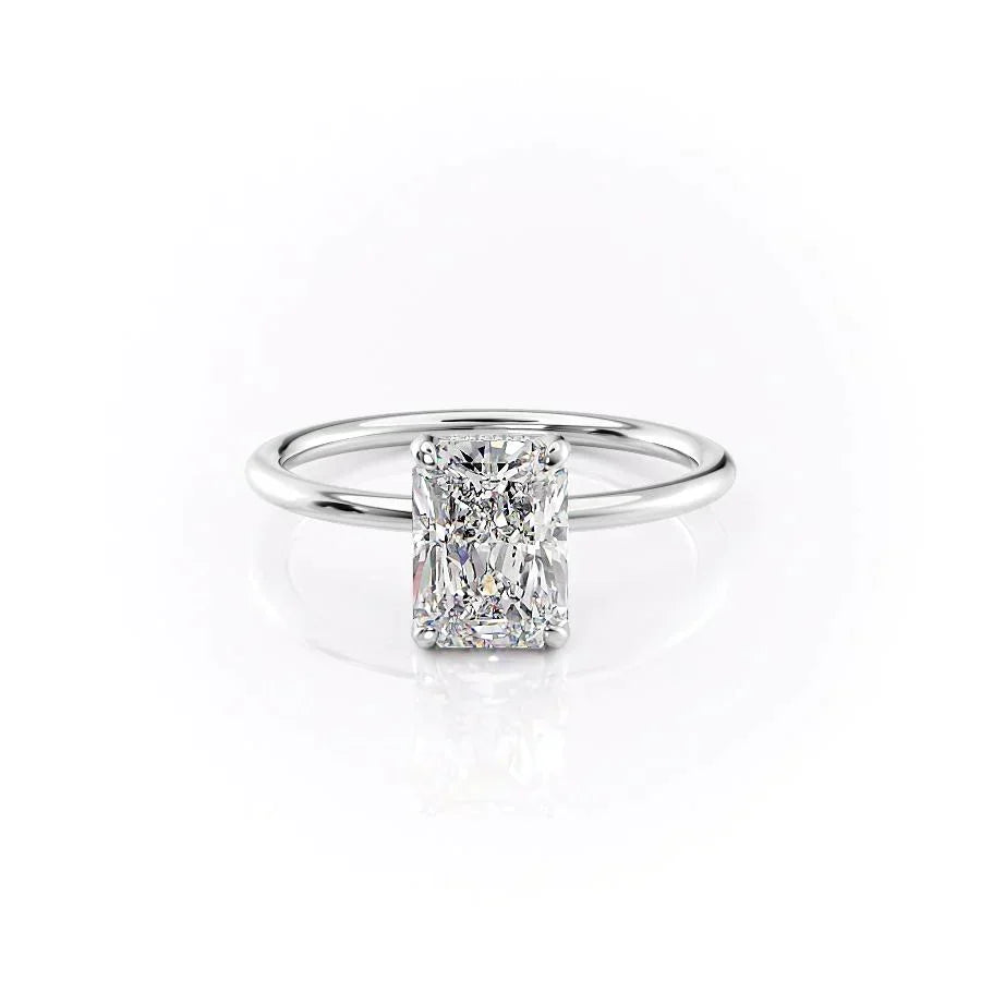 The Crown Kamellie. A White Gold Solitaire, Hidden Halo Engagement Ring Set With A 2ct Radiant Lab Grown Diamond. White Background.