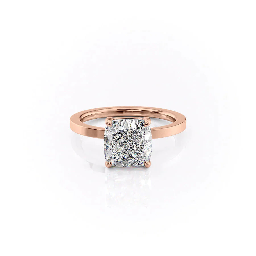 The Eleanor. A Rose Gold Solitaire Engagement Ring Set With A 2ct Cushion Lab Grown Diamond. White Background.
