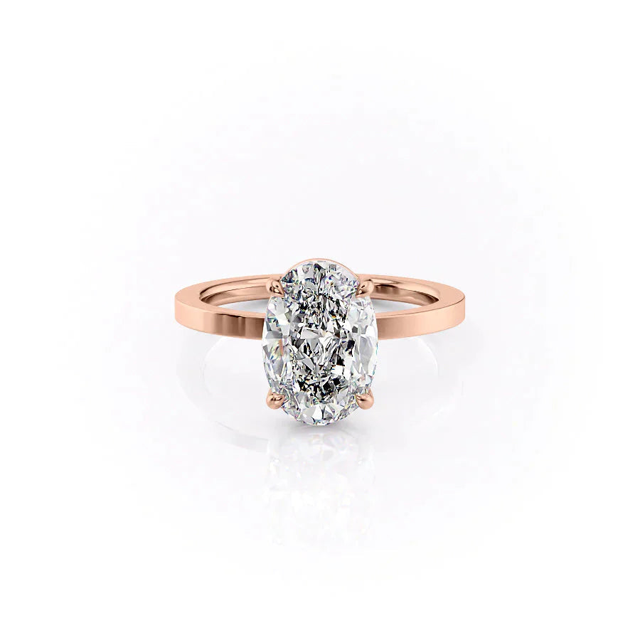 The Eleanor. A Rose Gold Solitaire Engagement Ring Set With A 2ct Oval Lab Grown Diamond. White Background.