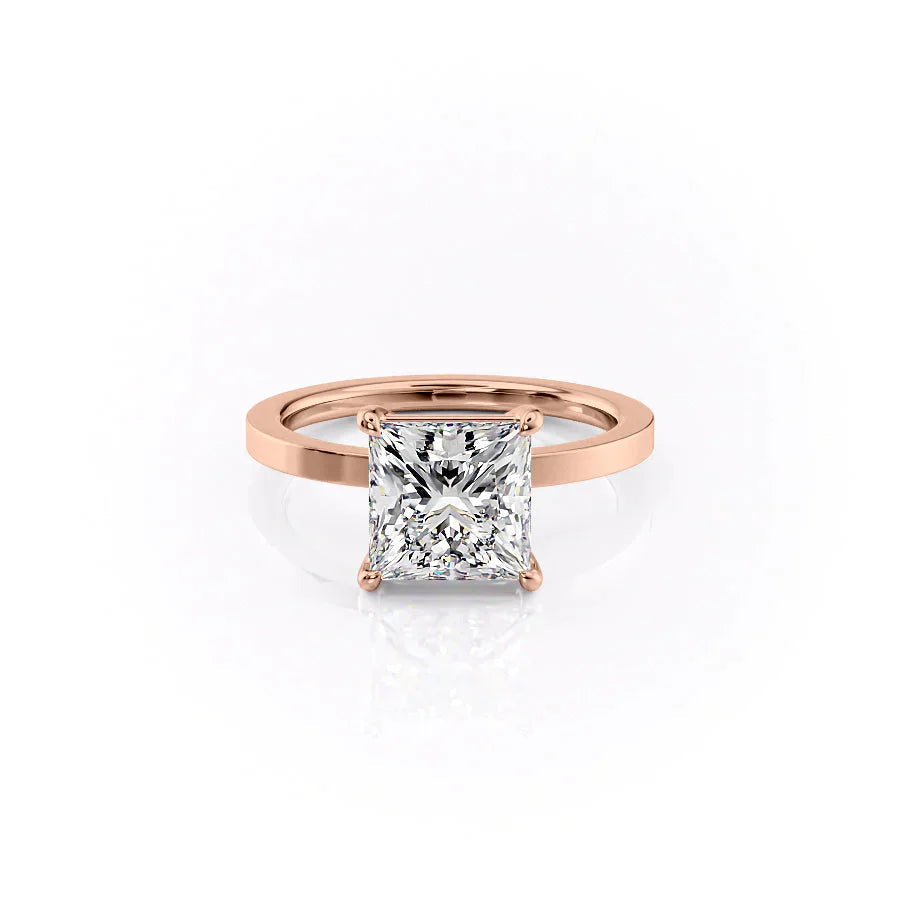 The Eleanor. A Rose Gold Solitaire Engagement Ring Set With A 2ct Princess Lab Grown Diamond. White Background.