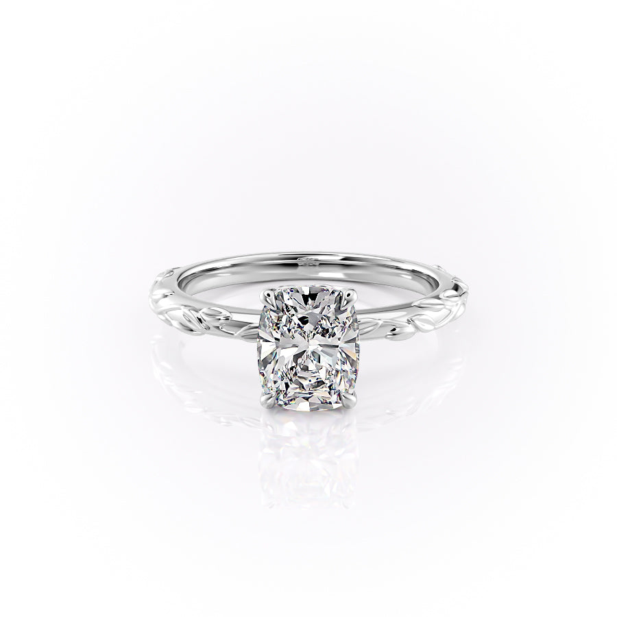 The Flora. A White Gold Nature, Solitaire Engagement Ring Set With A 2ct Elongated Cushion Lab Grown Diamond. White Background.