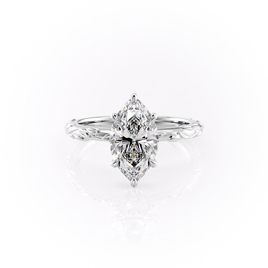 The Flora. A White Gold Nature, Solitaire Engagement Ring Set With A 2ct Marquise Lab Grown Diamond. White Background.