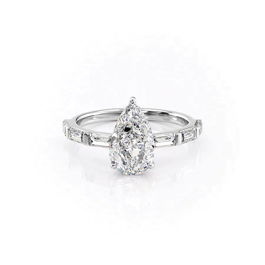 The Hailey. A White Gold Channel-Set, Side Stones, Hidden Halo Engagement Ring Set With A 2ct Pear Lab Grown Diamond. White Background.