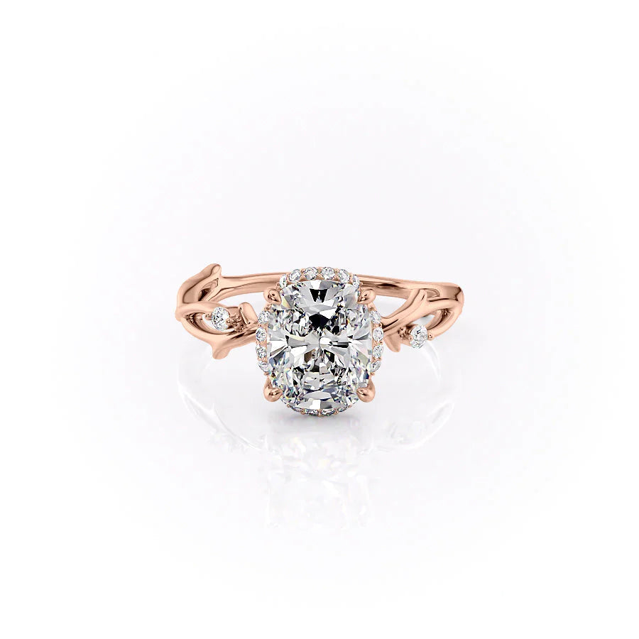 The Halo Twig. A Rose Gold Nature Engagement Ring Set With A 2ct Elongated Cushion Lab Grown Diamond. White Background.