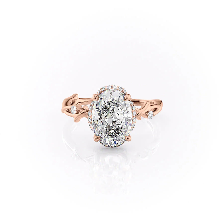 The Halo Twig. A Rose Gold Nature Engagement Ring Set With A 2ct Oval Lab Grown Diamond. White Background.