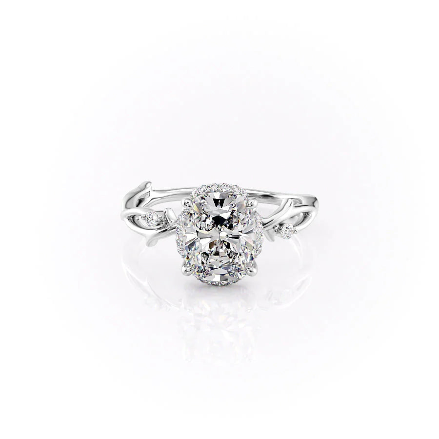 The Halo Twig. A White Gold Nature Engagement Ring Set With A 2ct Elongated Cushion Lab Grown Diamond. White Background.