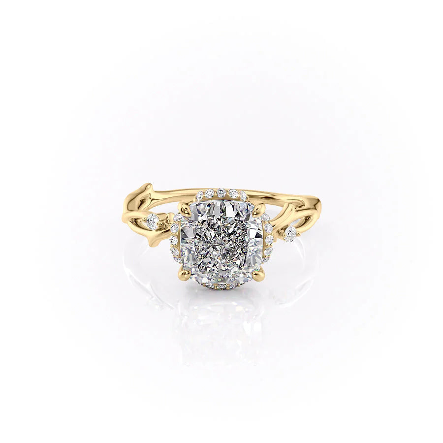 The Halo Twig. A Yellow Gold Nature Engagement Ring Set With A 2ct Cushion Lab Grown Diamond. White Background.