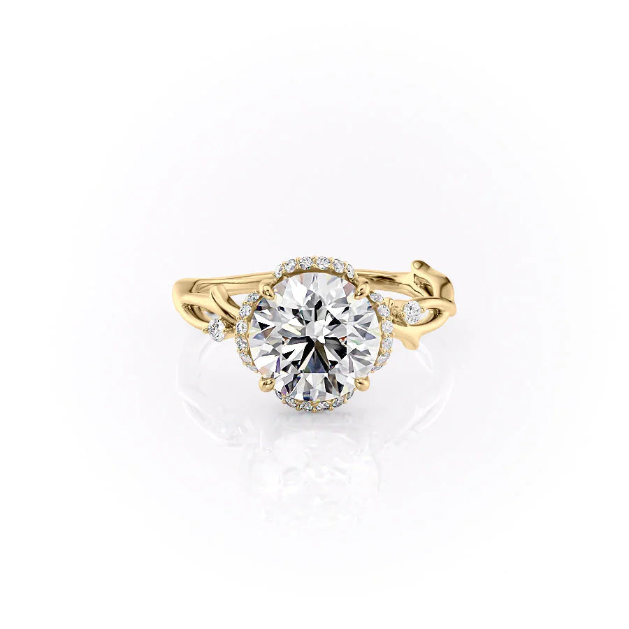 The Halo Twig. A Yellow Gold Nature Engagement Ring Set With A 2ct Round Lab Grown Diamond. White Background.