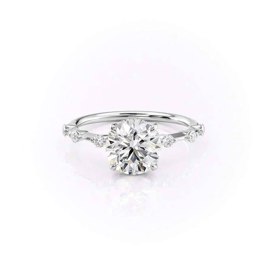 The Hidden Halo Penelope. A White Gold Side Stones Engagement Ring Set With A 2ct Round Lab Grown Diamond. White Background.