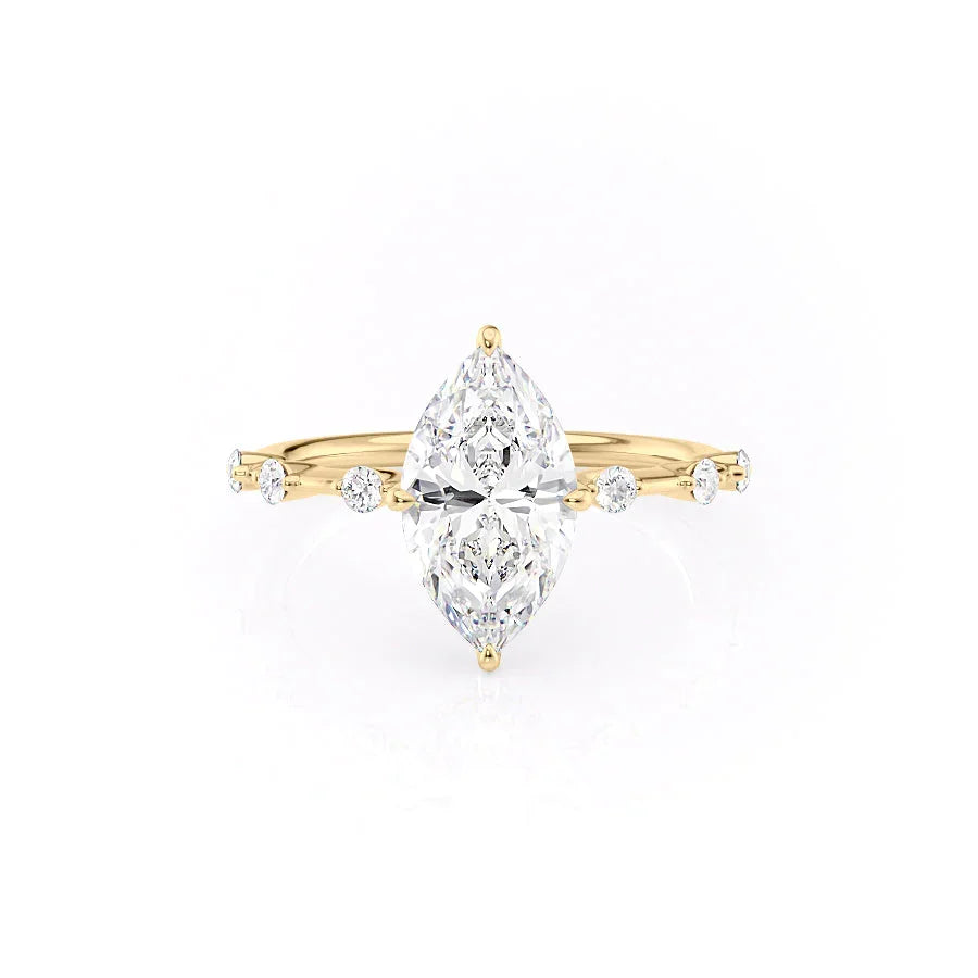 The Hidden Halo Penelope. A Yellow Gold Side Stones Engagement Ring Set With A 2ct Marquise Lab Grown Diamond. White Background.