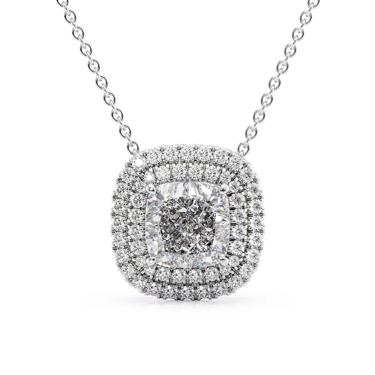 The Isabella. A White Gold Pendant Set With A 2ct Cushion Lab Grown Diamond. White Background.