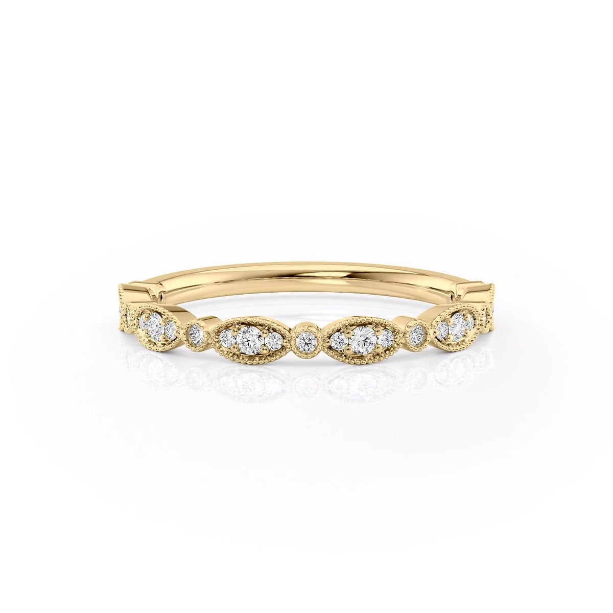 The Jasmine. A Yellow Gold Pave, Prong Wedding Band Set With 0.2tcw Round Lab Grown Diamonds. White Background.
