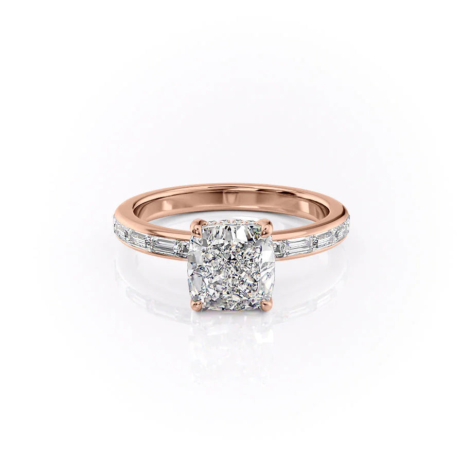 The Jennifer. A Rose Gold Channel-Set, Side Stones, Hidden Halo Engagement Ring Set With A 2ct Cushion Lab Grown Diamond. White Background.
