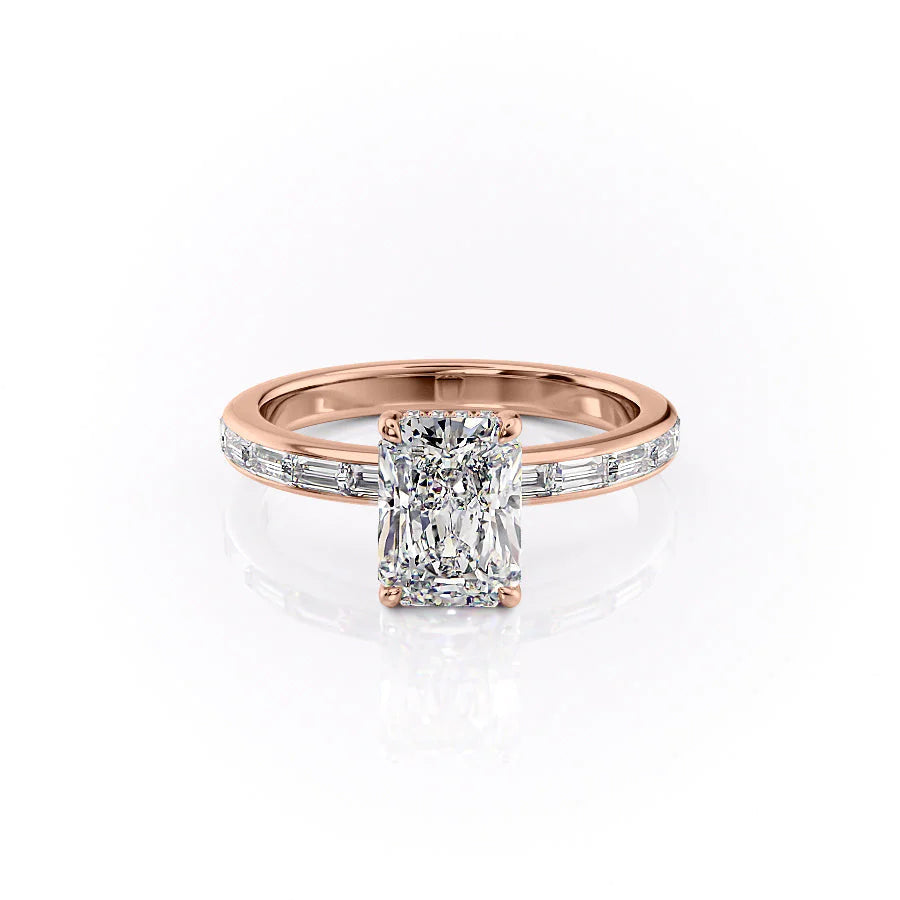 The Jennifer. A Rose Gold Channel-Set, Side Stones, Hidden Halo Engagement Ring Set With A 2ct Radiant Lab Grown Diamond. White Background.