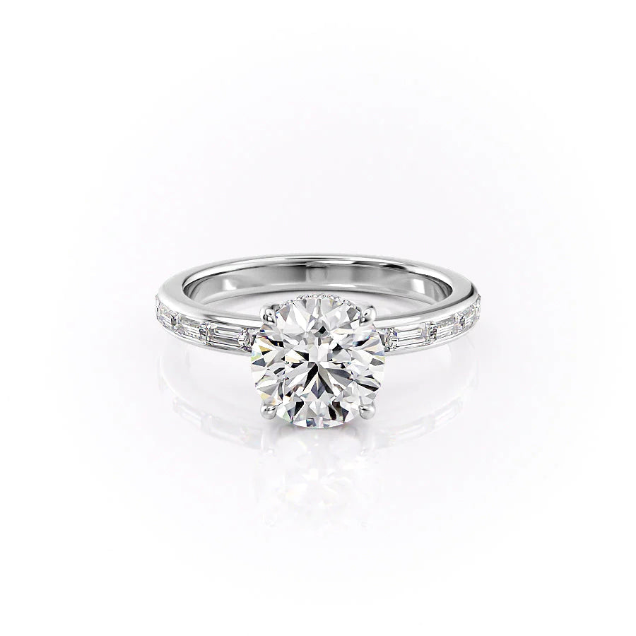 The Jennifer. A White Gold Channel-Set, Side Stones, Hidden Halo Engagement Ring Set With A 2ct Round Lab Grown Diamond. White Background.