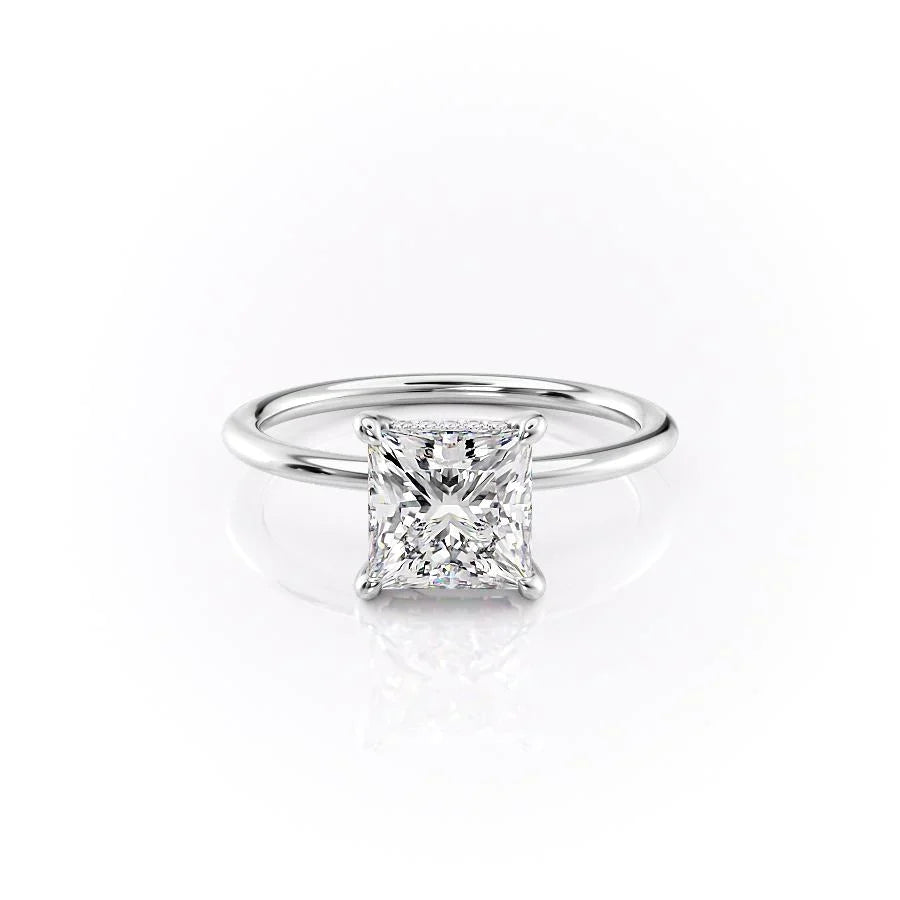 The Kamellie. A White Gold Solitaire, Hidden Halo Engagement Ring Set With A 2ct Princess Lab Grown Diamond. White Background.