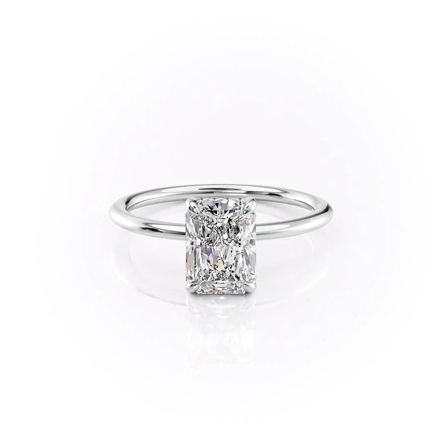 The Kamellie. A White Gold Solitaire, Hidden Halo Engagement Ring Set With A 2ct Radiant Lab Grown Diamond. White Background.