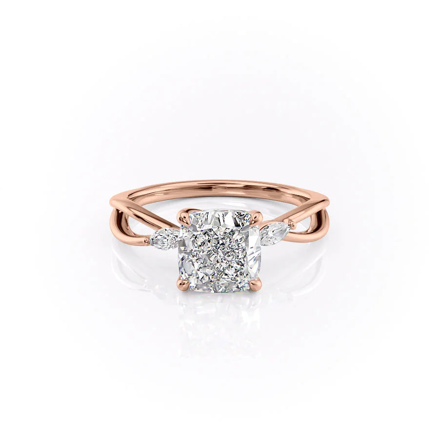 The Kelsey. A Rose Gold Side Stones Engagement Ring Set With A 2ct Cushion Lab Grown Diamond. White Background.