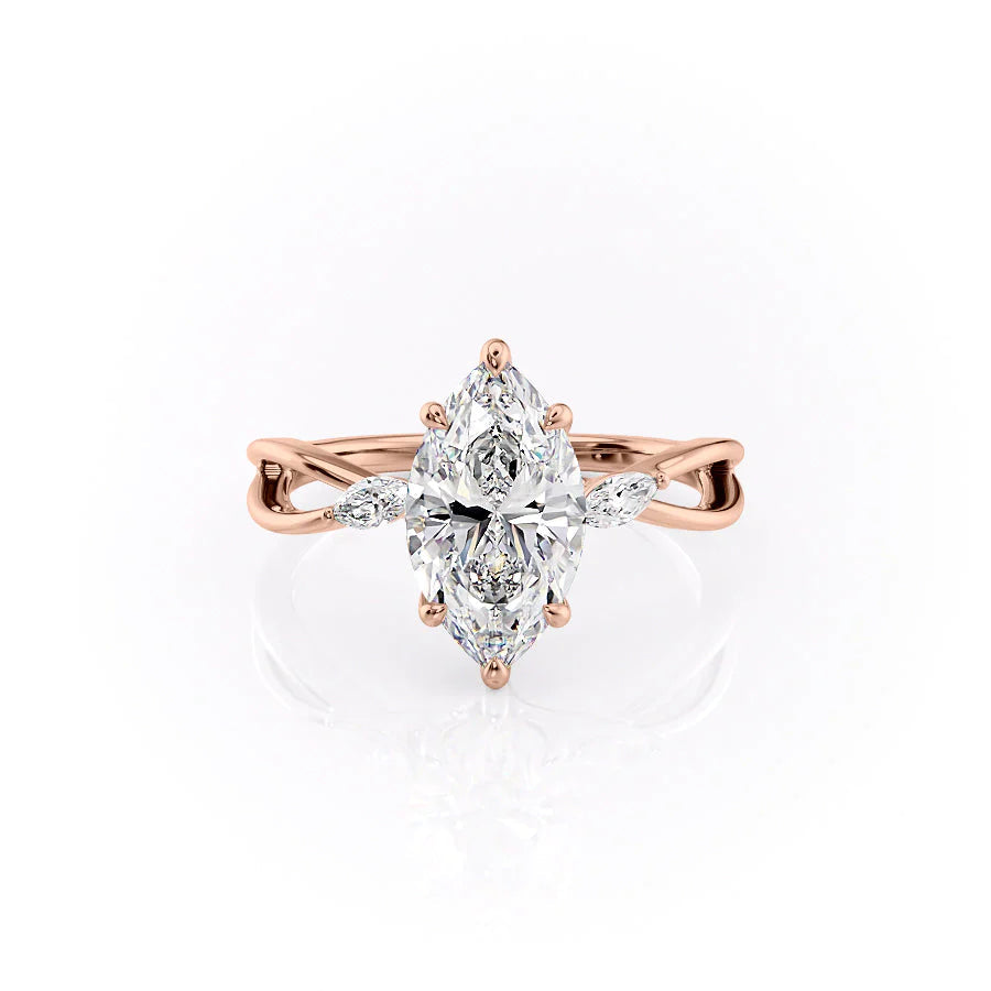 The Kelsey. A Rose Gold Side Stones Engagement Ring Set With A 2ct Marquise Lab Grown Diamond. White Background.