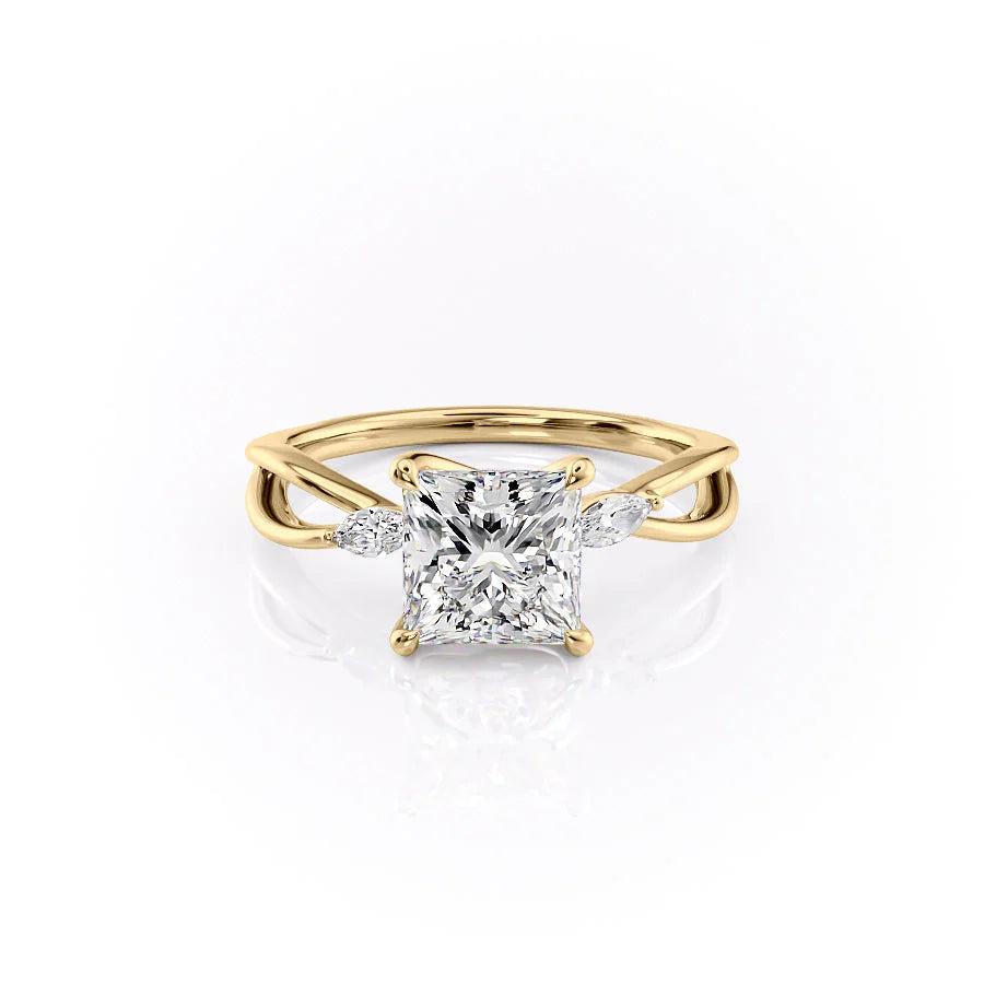 The Kelsey. A Yellow Gold Side Stones Engagement Ring Set With A 2ct Princess Lab Grown Diamond. White Background.