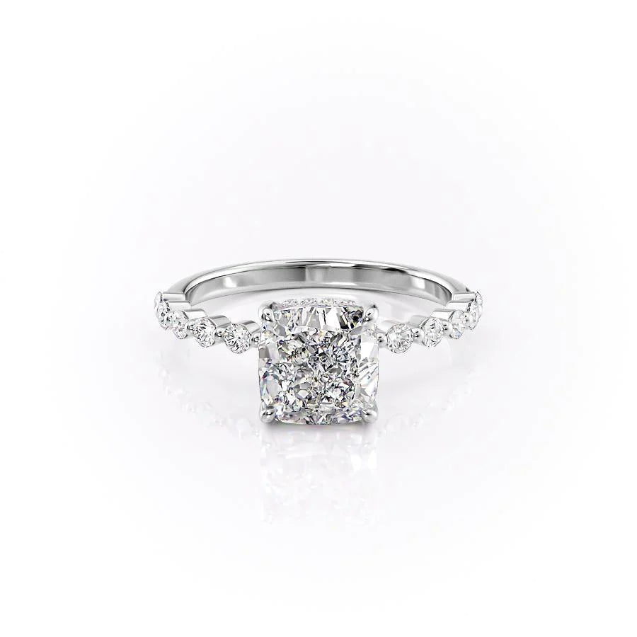 The Khloe. A White Gold Side Stones, Hidden Halo Engagement Ring Set With A 2ct Cushion Lab Grown Diamond. White Background.