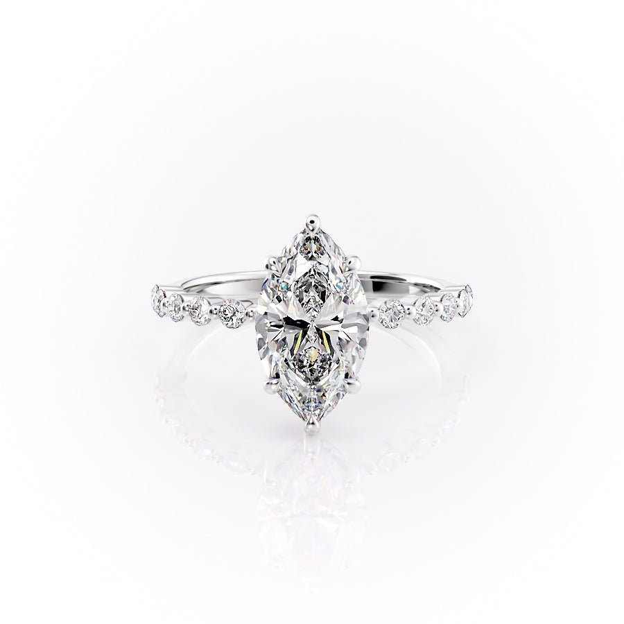The Khloe. A White Gold Side Stones, Hidden Halo Engagement Ring Set With A 2ct Marquise Lab Grown Diamond. White Background.