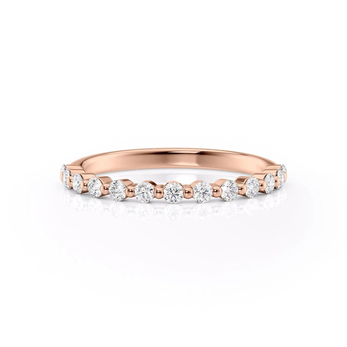 The Khloe. A Rose Gold Prong Wedding Band Set With 0.3tcw Round Lab Grown Diamonds. White Background.