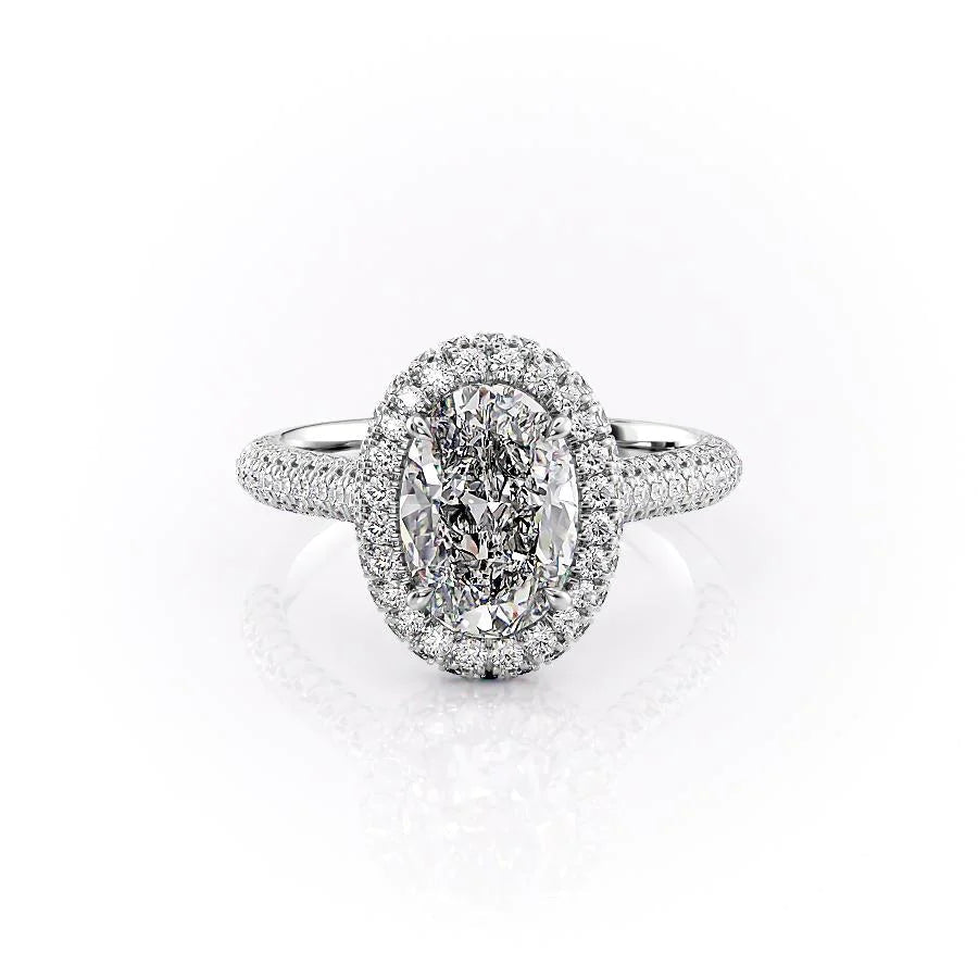 The Kylie. A White Gold Halo, Pave Engagement Ring Set With A 2ct Oval Lab Grown Diamond. White Background.