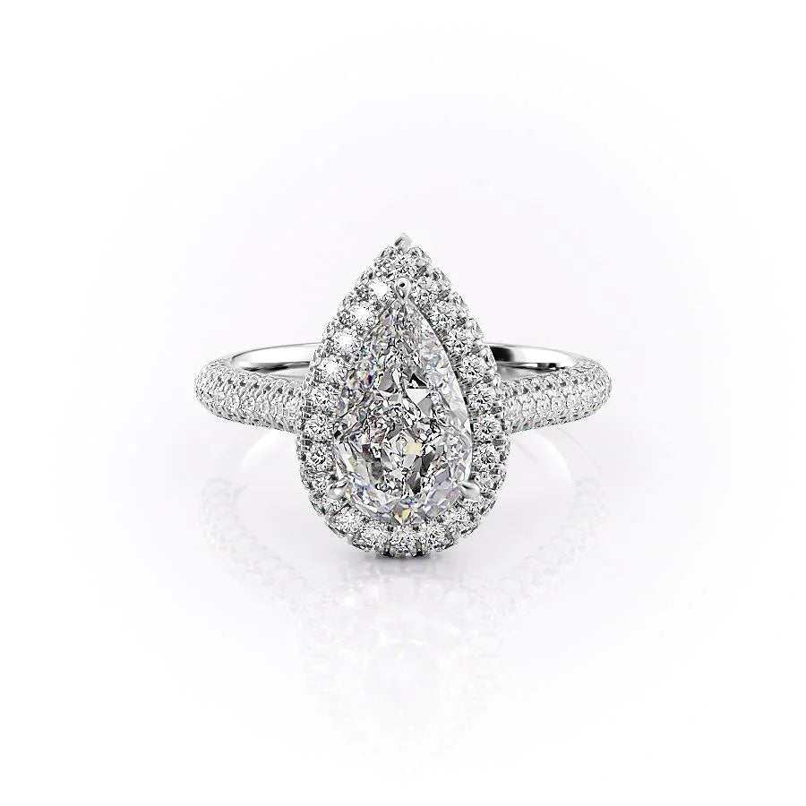 The Kylie. A White Gold Halo, Pave Engagement Ring Set With A 2ct Pear Lab Grown Diamond. White Background.