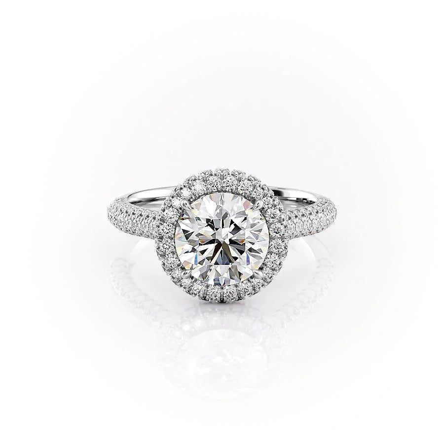 The Kylie. A White Gold Halo, Pave Engagement Ring Set With A 2ct Round Lab Grown Diamond. White Background.