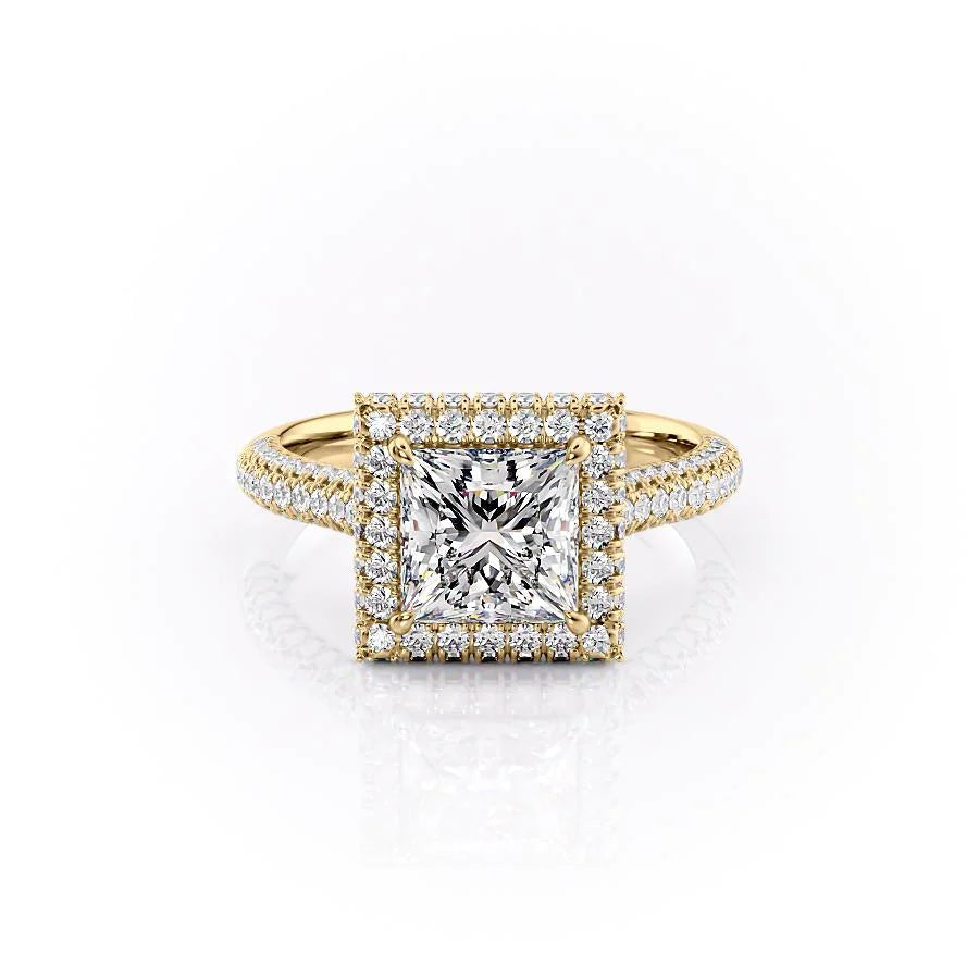 The Kylie. A Yellow Gold Halo, Pave Engagement Ring Set With A 2ct Princess Lab Grown Diamond. White Background.
