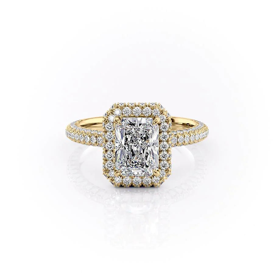 The Kylie. A Yellow Gold Halo, Pave Engagement Ring Set With A 2ct Radiant Lab Grown Diamond. White Background.