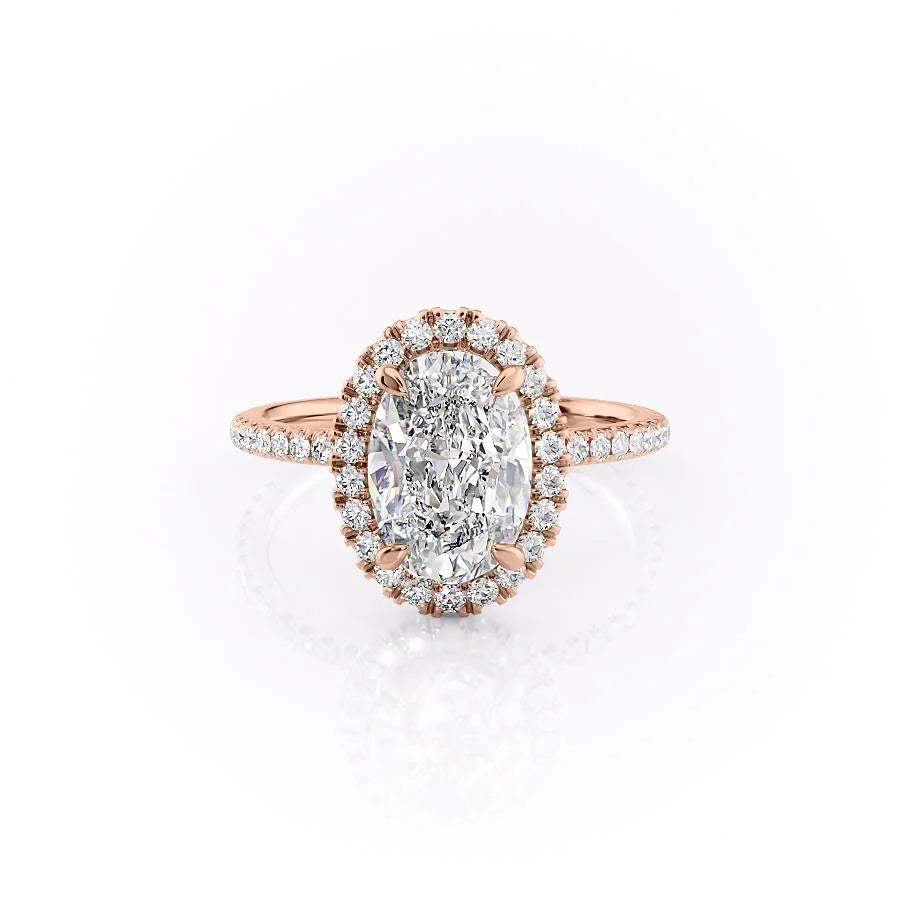 The Lenny. A Rose Gold Halo, Pave Engagement Ring Set With A 2ct Oval Lab Grown Diamond. White Background.