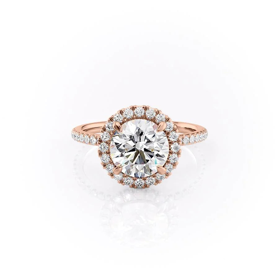 The Lenny. A Rose Gold Halo, Pave Engagement Ring Set With A 2ct Round Lab Grown Diamond. White Background.