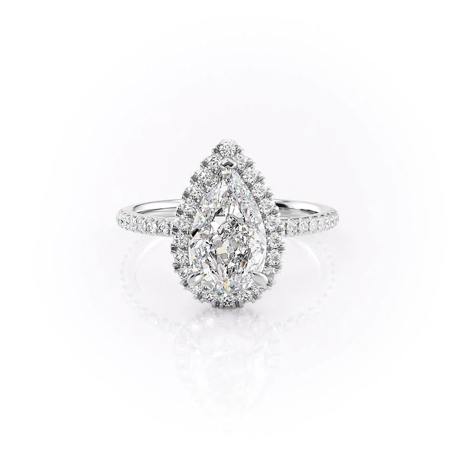 The Lenny. A White Gold Halo, Pave Engagement Ring Set With A 2ct Pear Lab Grown Diamond. White Background.