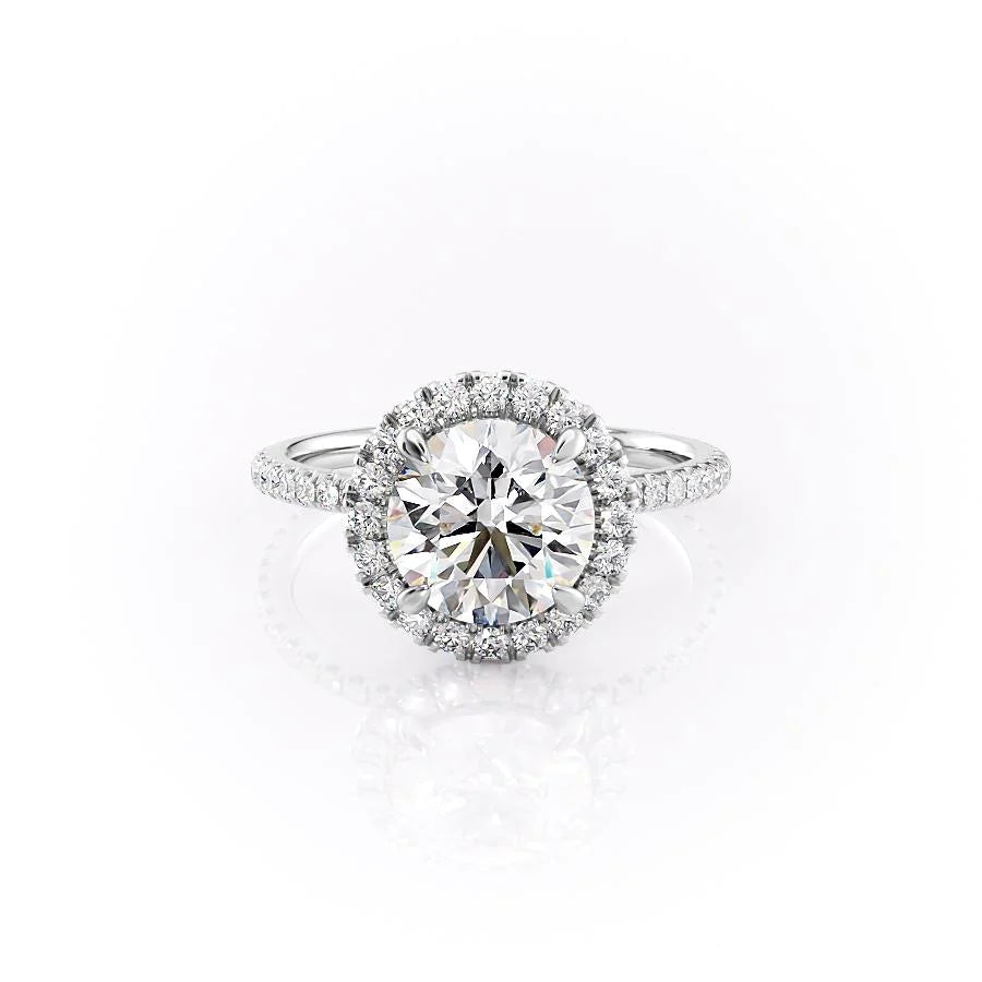 The Lenny. A White Gold Halo, Pave Engagement Ring Set With A 2ct Round Lab Grown Diamond. White Background.