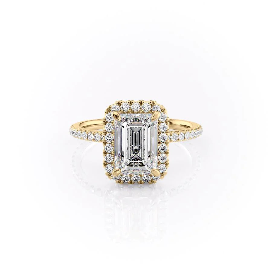 The Lenny. A Yellow Gold Halo, Pave Engagement Ring Set With A 2ct Emerald Lab Grown Diamond. White Background.