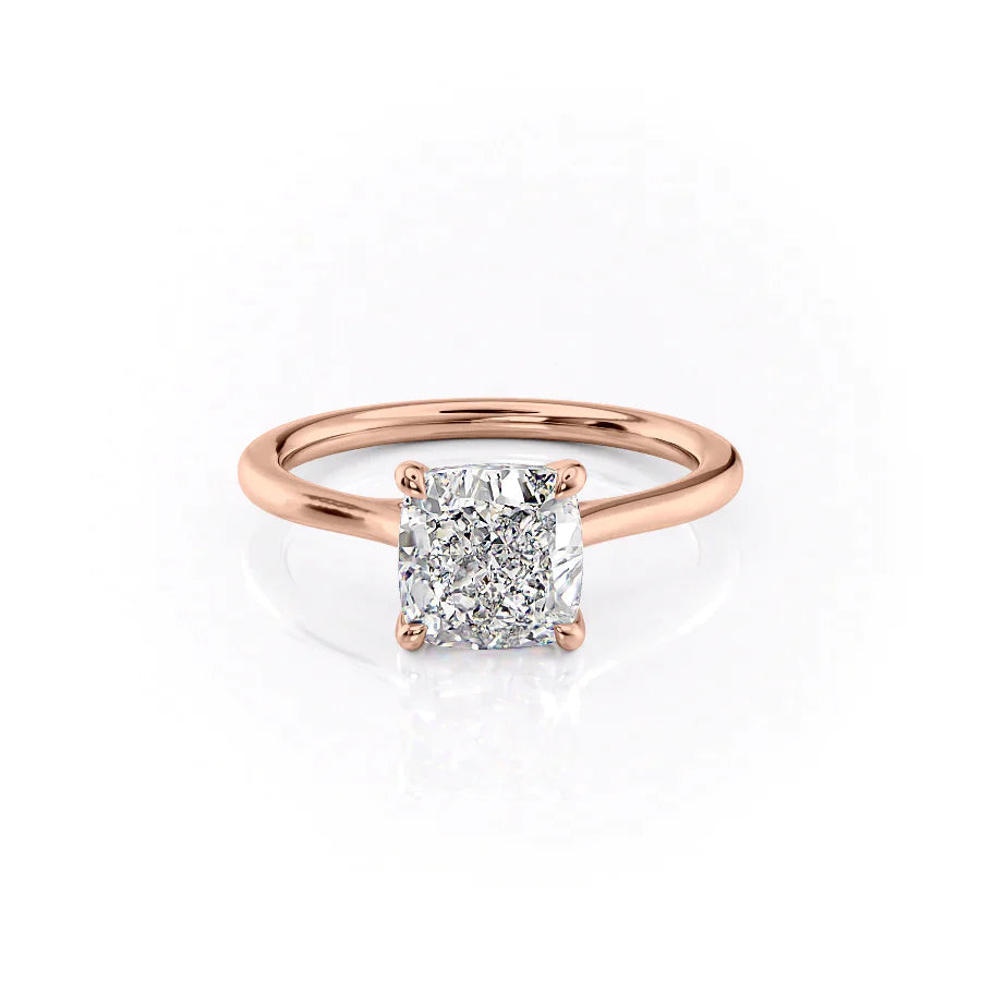 The Lexie. A Rose Gold Solitaire Engagement Ring Set With A 2ct Cushion Lab Grown Diamond. White Background.