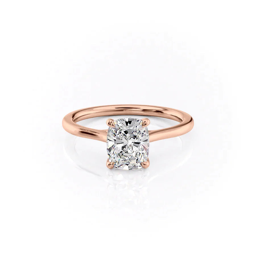 The Lexie. A Rose Gold Solitaire Engagement Ring Set With A 2ct Elongated Cushion Lab Grown Diamond. White Background.