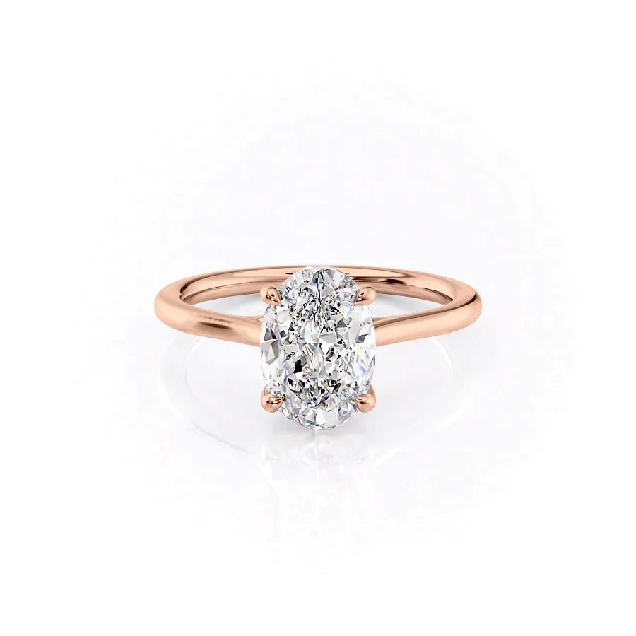 The Lexie. A Rose Gold Solitaire Engagement Ring Set With A 2ct Oval Lab Grown Diamond. White Background.