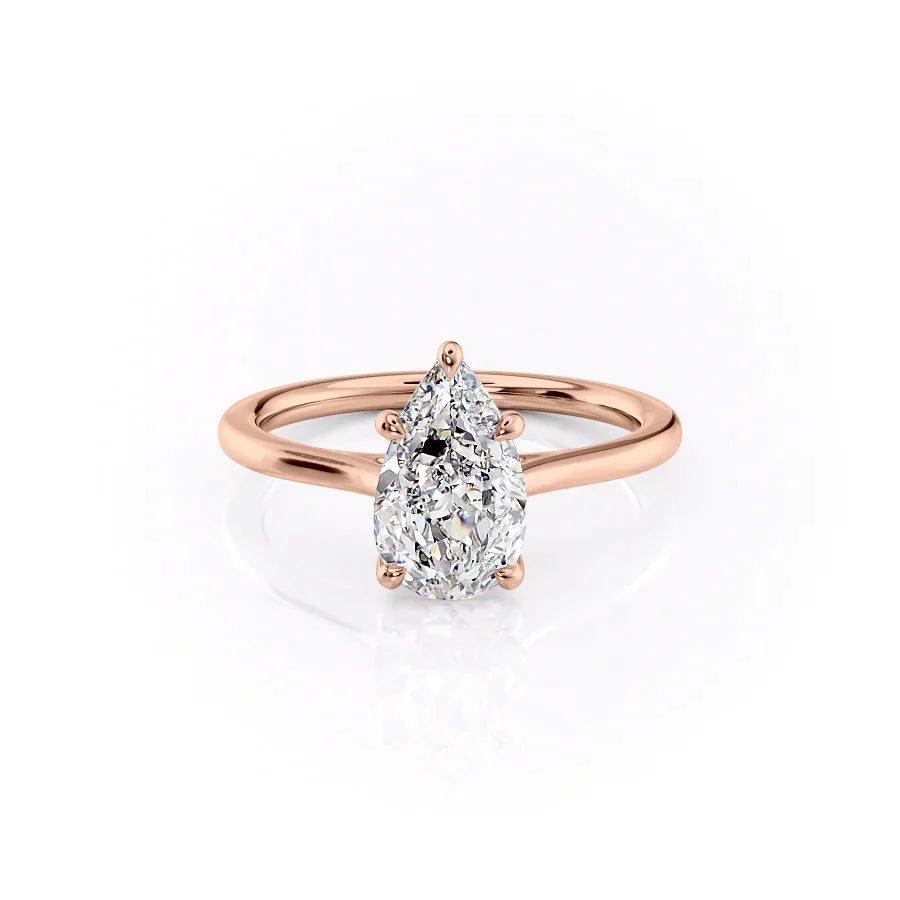 The Lexie. A Rose Gold Solitaire Engagement Ring Set With A 2ct Pear Lab Grown Diamond. White Background.