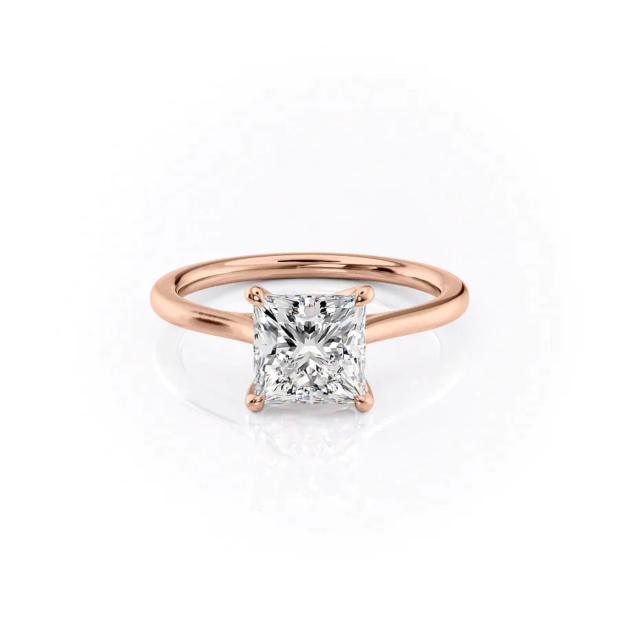 The Lexie. A Rose Gold Solitaire Engagement Ring Set With A 2ct Princess Lab Grown Diamond. White Background.