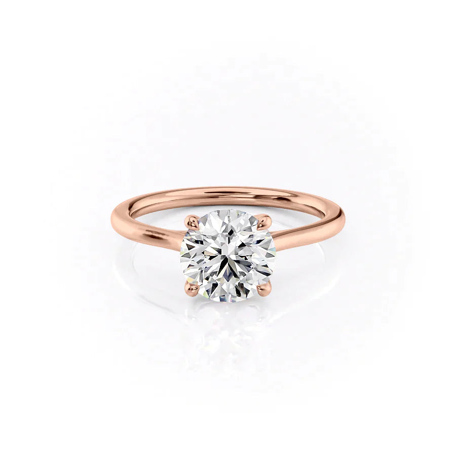 The Lexie. A Rose Gold Solitaire Engagement Ring Set With A 2ct Round Lab Grown Diamond. White Background.