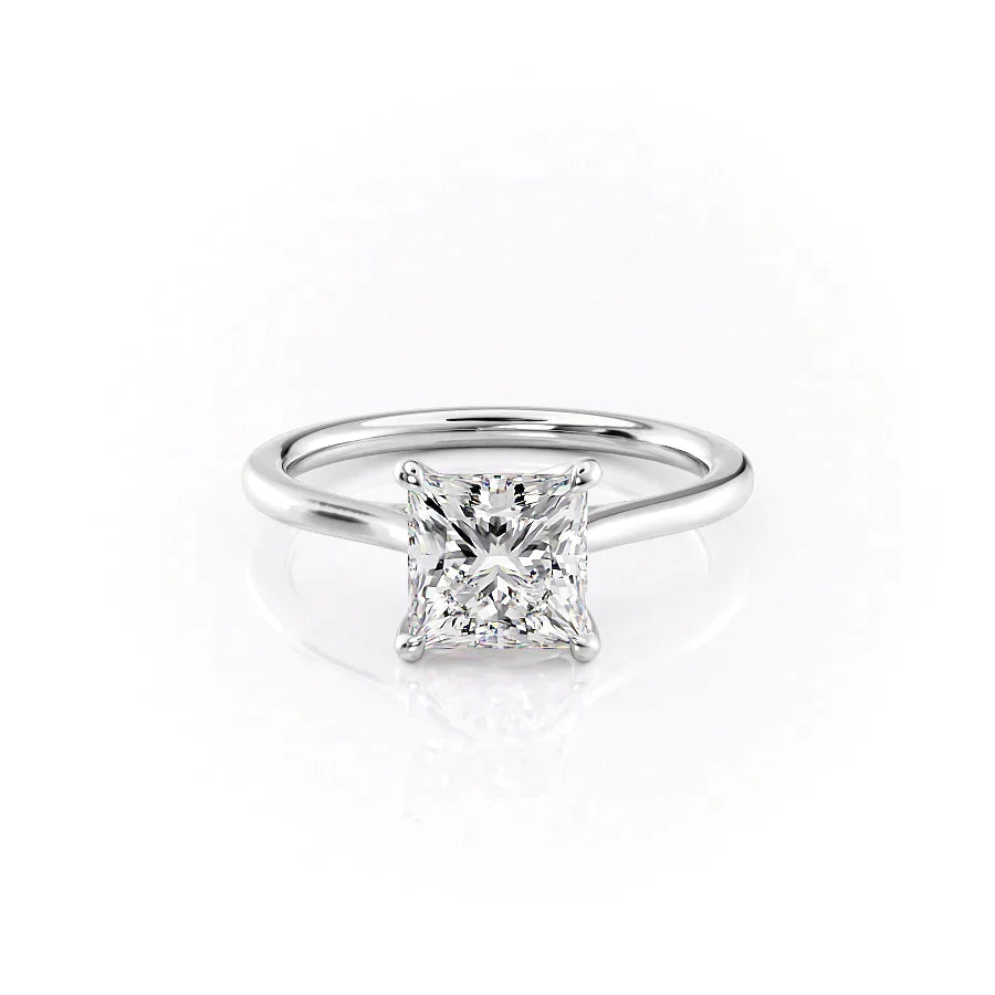The Lexie. A White Gold Solitaire Engagement Ring Set With A 2ct Princess Lab Grown Diamond. White Background.