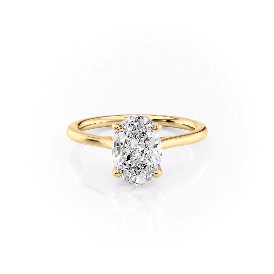 The Lexie. A Yellow Gold Solitaire Engagement Ring Set With A 2ct Oval Lab Grown Diamond. White Background.
