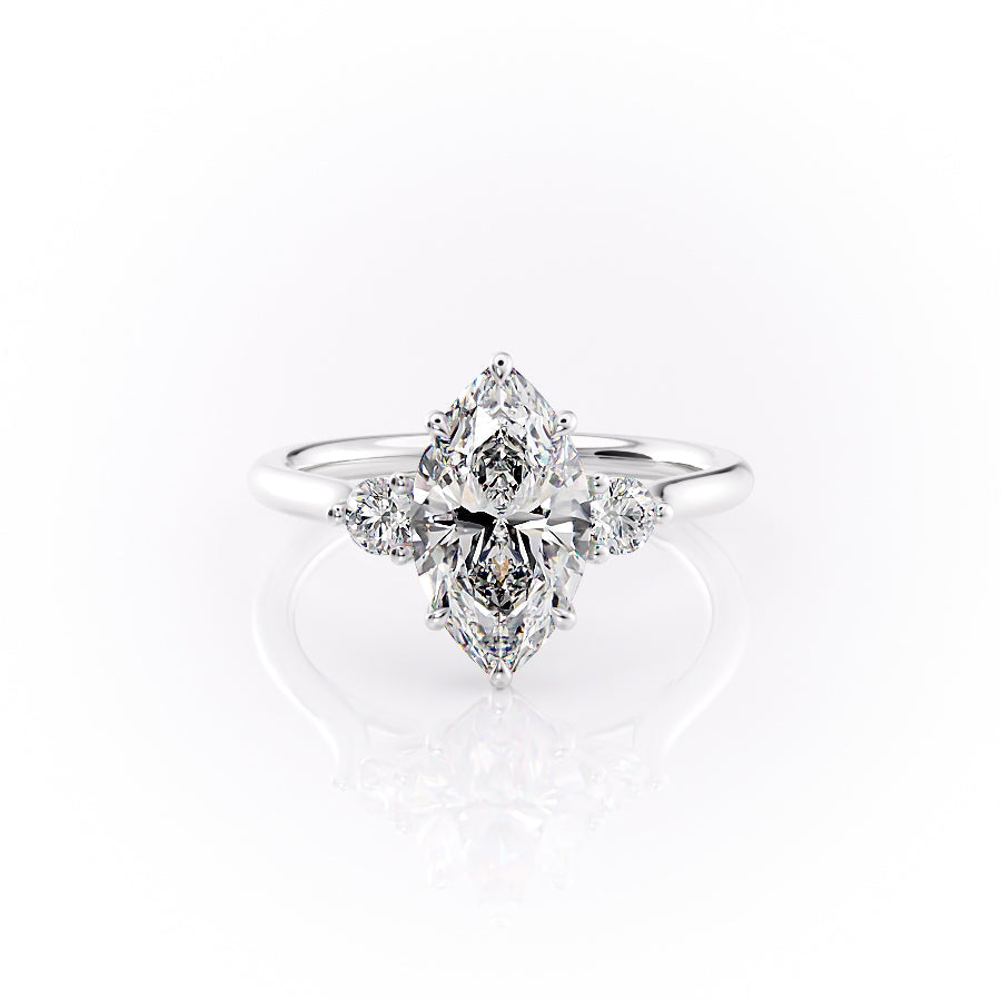 The Lia. A White Gold Three Stone Engagement Ring Set With A 2ct Marquise Lab Grown Diamond. White Background.