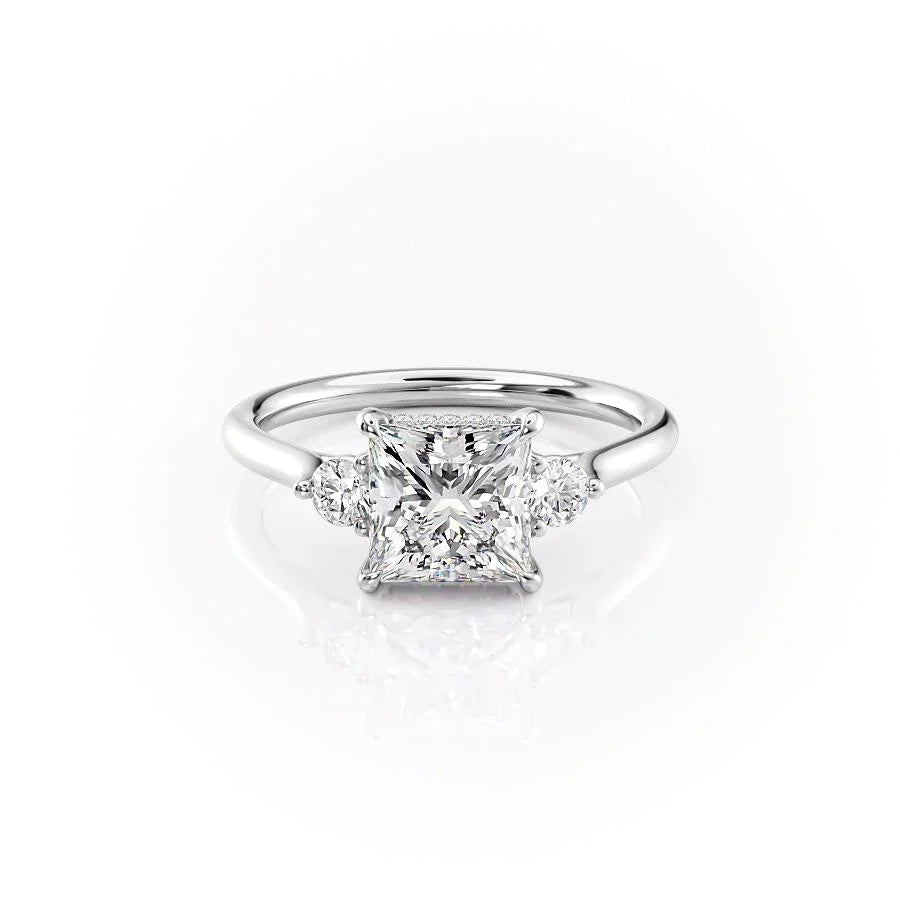 The Lia. A White Gold Three Stone Engagement Ring Set With A 2ct Princess Lab Grown Diamond. White Background.